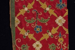 Fragment of embroidered fabric, Florentine manufacture, end of XVI cent. Satin applique embroidery; silk, silver and gold interfacing, spun gold, silver purl